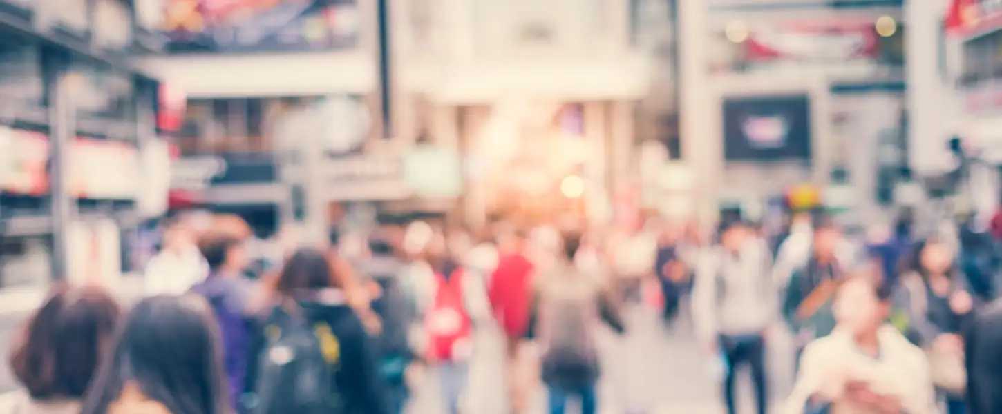 city-with-people-walking-out-of-focus.jpg